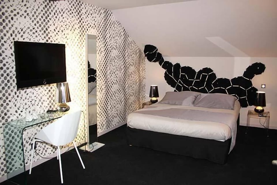 Animal Superior Room | Select Comfort beds, desk, blackout drapes, soundproofing