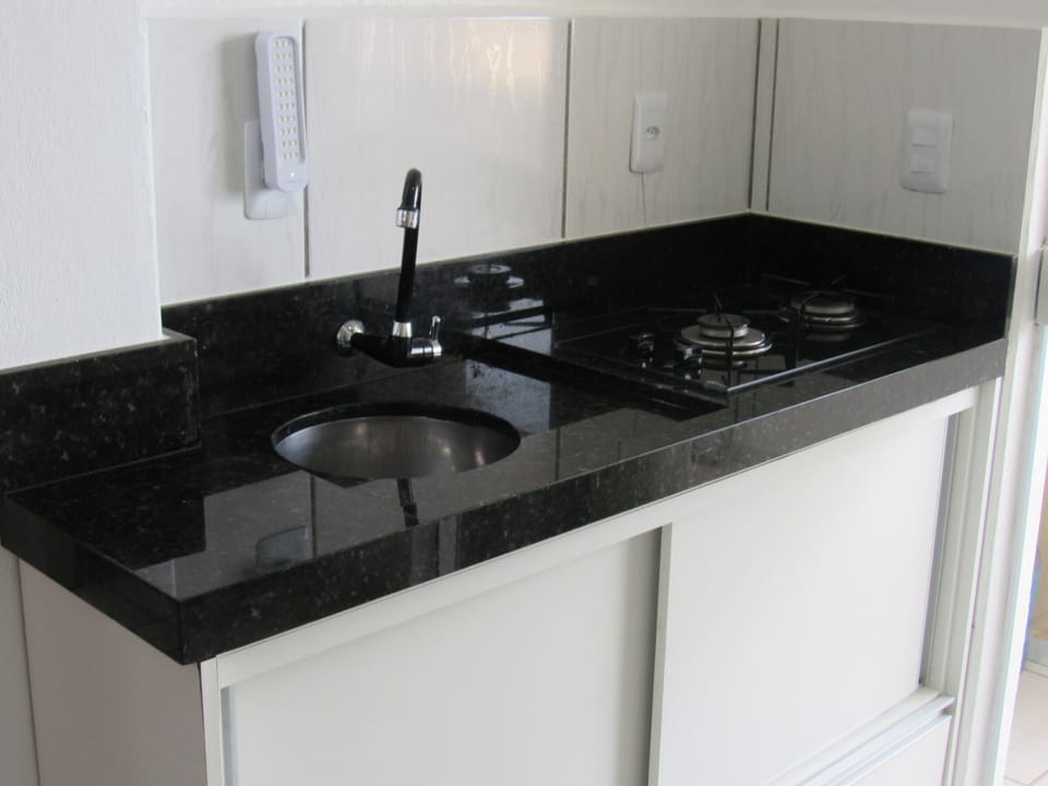 Standard Suite, Kitchenette | Private kitchen | Fridge, microwave, stovetop, cookware/dishes/utensils