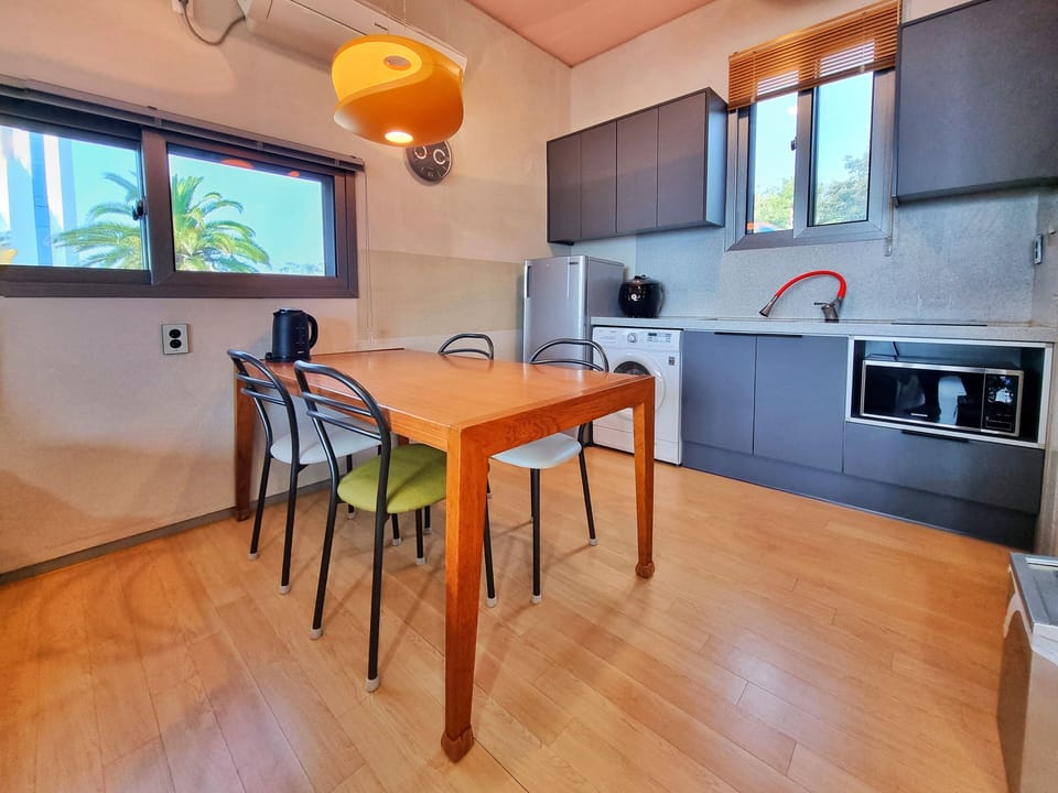 Superior Room | Private kitchen | Fridge, microwave, stovetop, coffee/tea maker