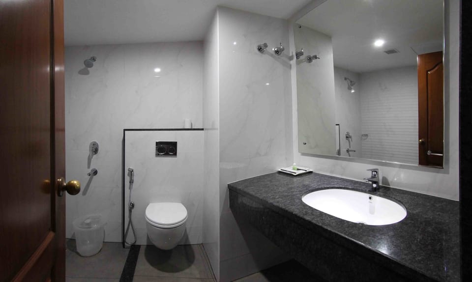 Executive Room (AC) | Bathroom | Shower, free toiletries, towels