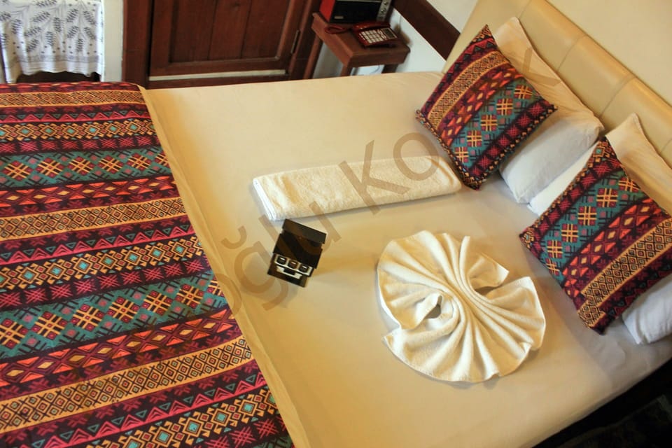Family Room | Premium bedding, desk, laptop workspace, free WiFi