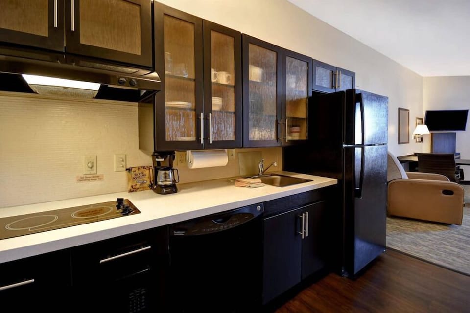 Studio Suite, 1 King Bed, Accessible (Communications) | Private kitchen | Full-size fridge, microwave, stovetop, dishwasher