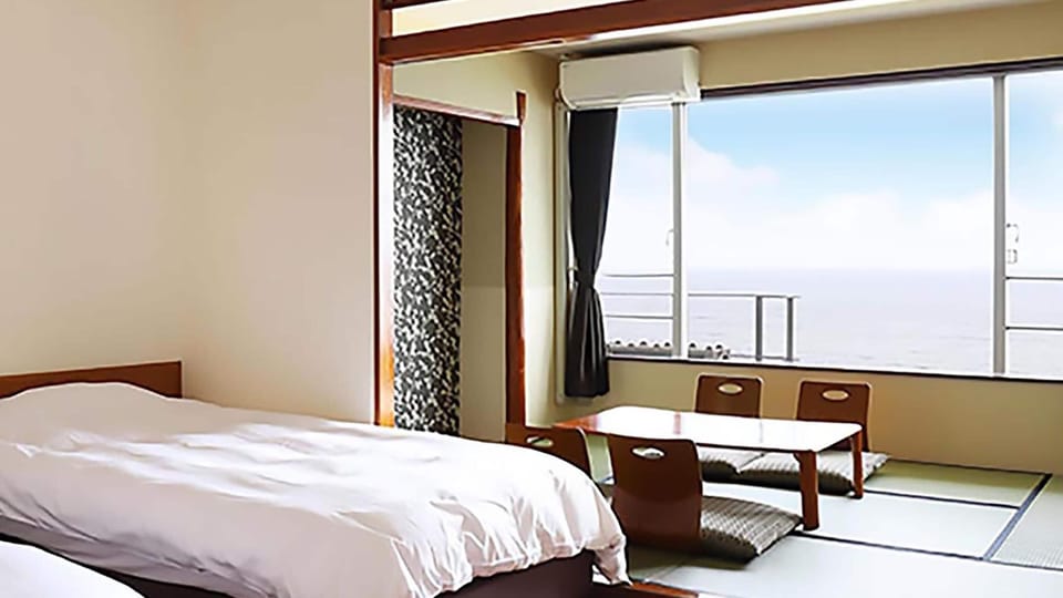 Japanese-Style Room with Ocean View, Smoking | In-room safe, bed sheets
