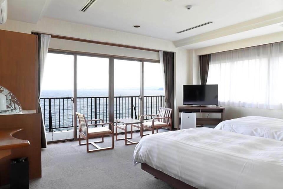 Standard Twin Room(Sea Side) - Indoor Bath - Non-Smoking | In-room safe, bed sheets