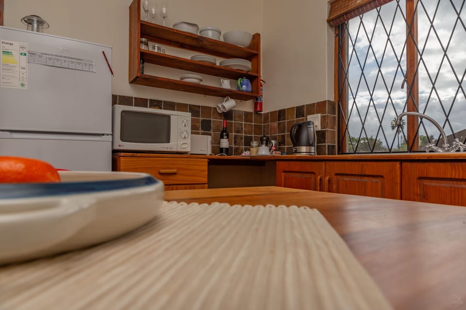 First Floor Apartment | Private kitchen | Full-size fridge, microwave, coffee/tea maker, electric kettle