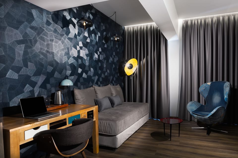 Junior Suite, Balcony | Living area | Flat-screen TV