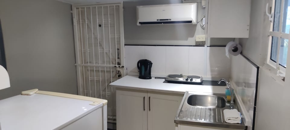 Refrigerator (on request), shared microwave, cookware/dishes/utensils