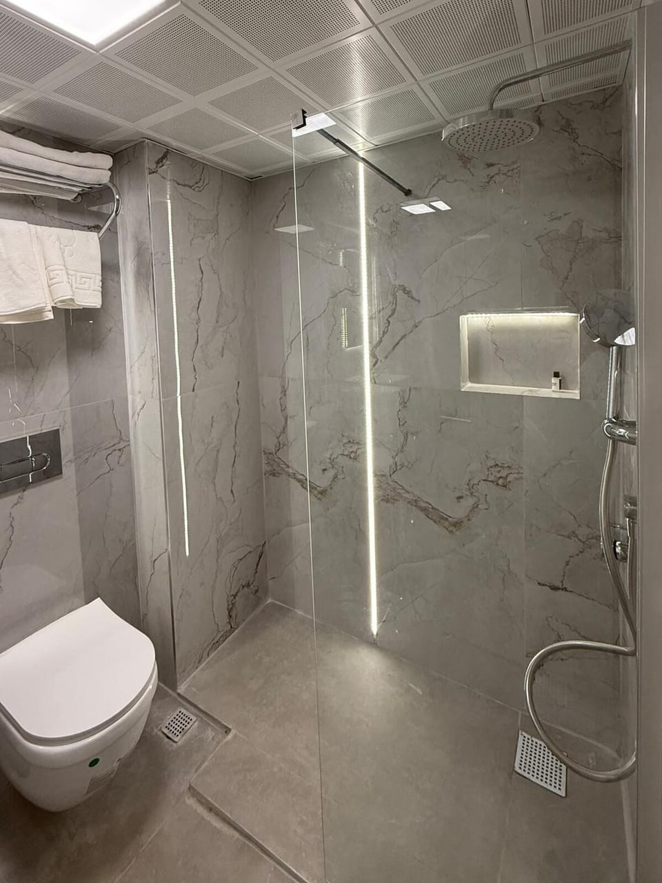 Shower, free toiletries, hair dryer, slippers