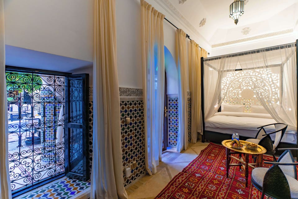 Romantic Suite, 1 King Bed, Courtyard View | Premium bedding, in-room safe, individually decorated