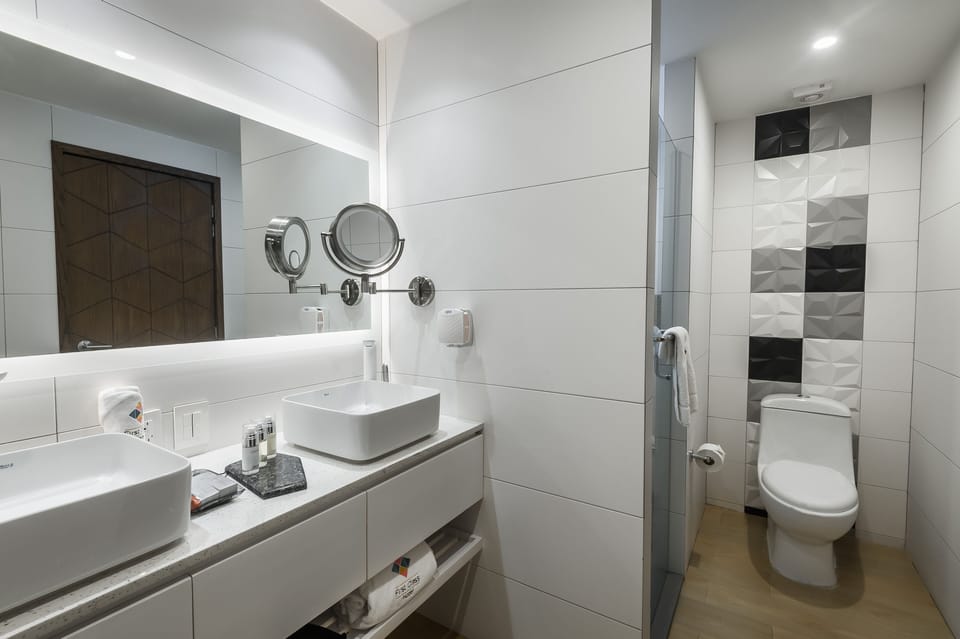 Hair dryer, towels, soap, shampoo