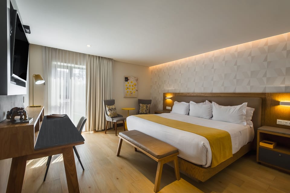 Standard Suite, 1 Queen Bed | In-room safe, iron/ironing board, free WiFi, bed sheets