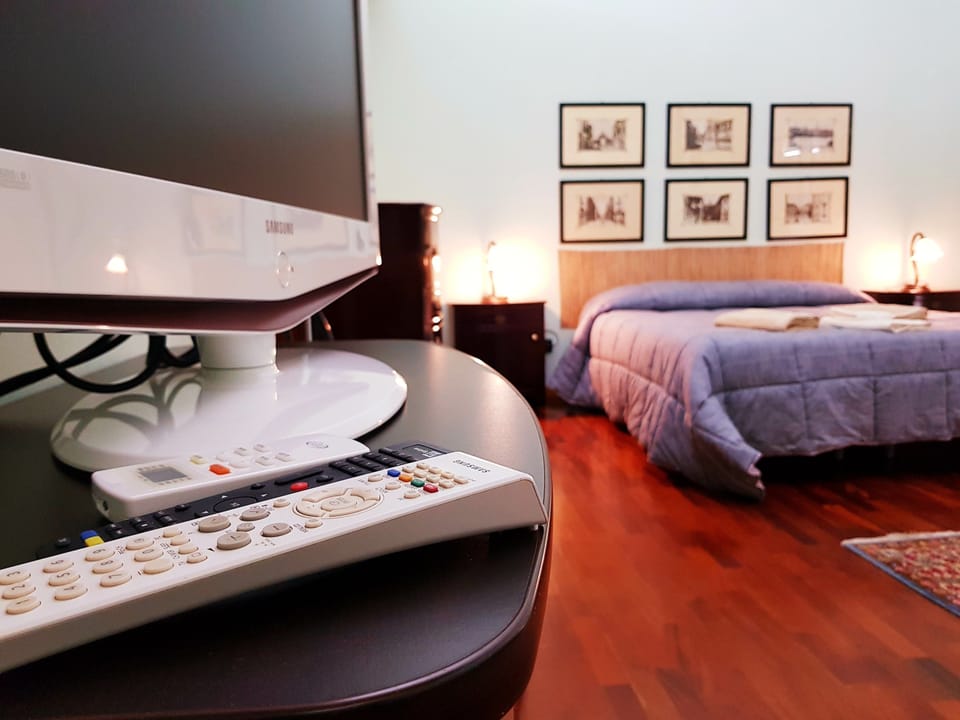 Comfort Quadruple Room, 2 Queen Beds, Private Bathroom, Garden View | Premium bedding, minibar, free WiFi, bed sheets