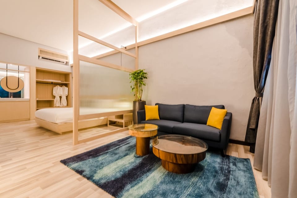 Courtyard Suite | Living area | 40-inch Smart TV with satellite channels, TV