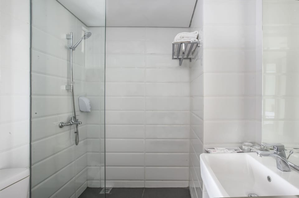 Shower, free toiletries, hair dryer, slippers