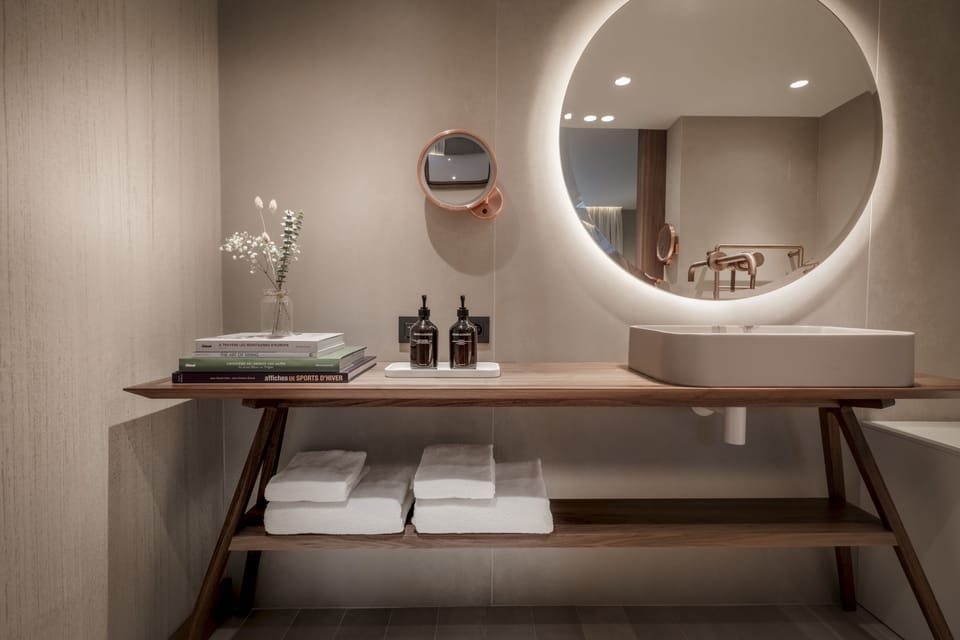 Junior Suite Terrace | Bathroom | Rainfall showerhead, designer toiletries, hair dryer, bathrobes