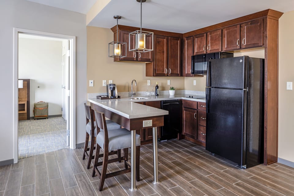 Suite, 1 Bedroom | Private kitchenette | Fridge, coffee/tea maker