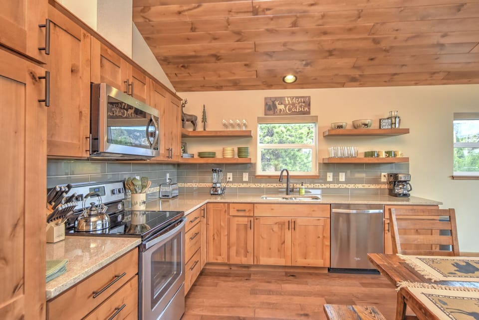 The open kitchen is fully stocked to enjoy cooking family meals at home