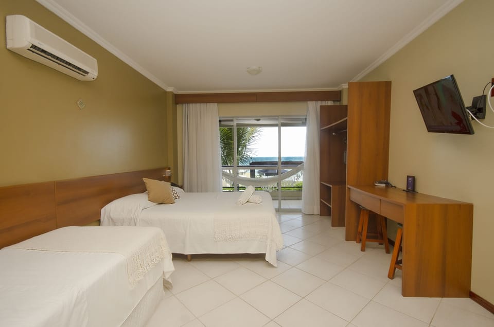 Panoramic Quadruple Room, Sea View | Minibar, in-room safe, blackout drapes, iron/ironing board