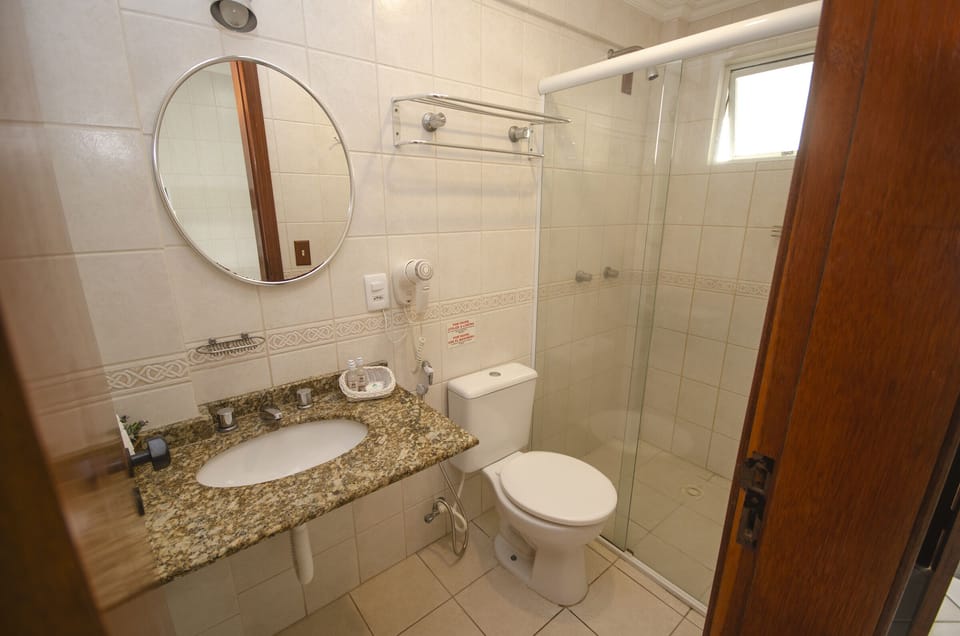 Panoramic Quadruple Room, Sea View | Bathroom | Shower, designer toiletries, hair dryer, towels