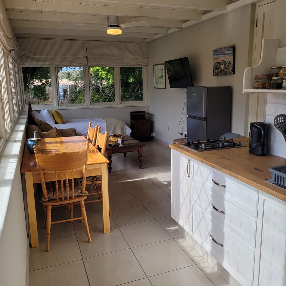Comfort Cottage | Living area | 39-inch flat-screen TV with satellite channels, TV, Netflix