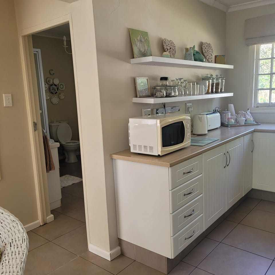 Luxury Bungalow, 2 Bedrooms | Private kitchen | Fridge, microwave, coffee/tea maker, electric kettle