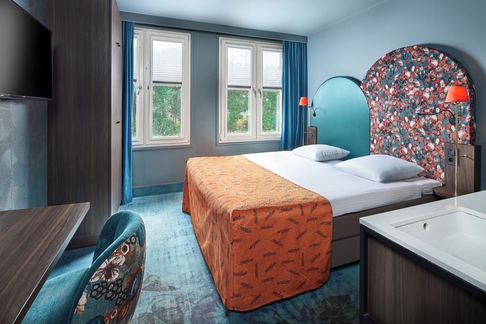 Deluxe Double Room | Minibar, in-room safe, desk, iron/ironing board