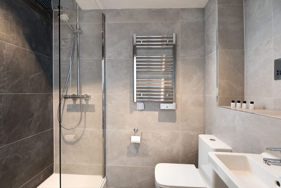 Shower, free toiletries, hair dryer, towels