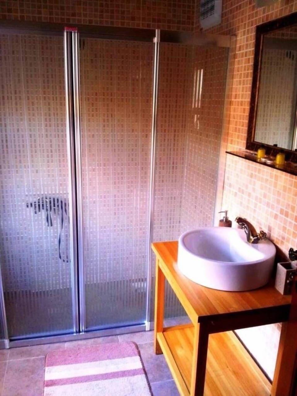Shower, free toiletries, hair dryer, slippers