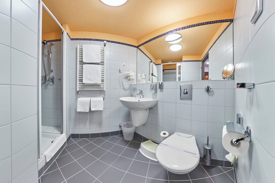 Shower, free toiletries, hair dryer, bathrobes