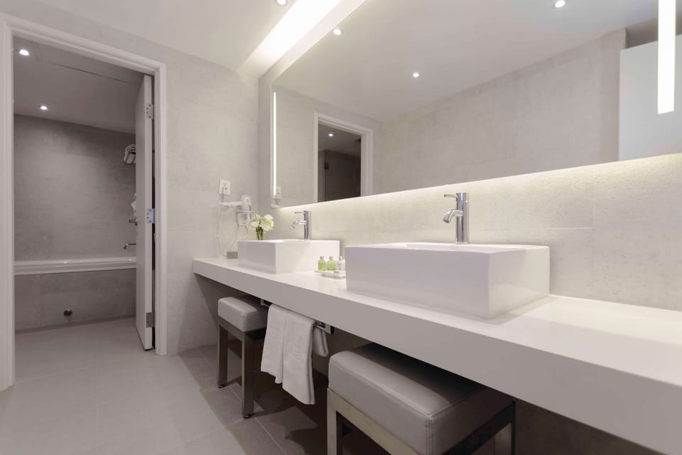 Shower, rainfall showerhead, eco-friendly toiletries, hair dryer