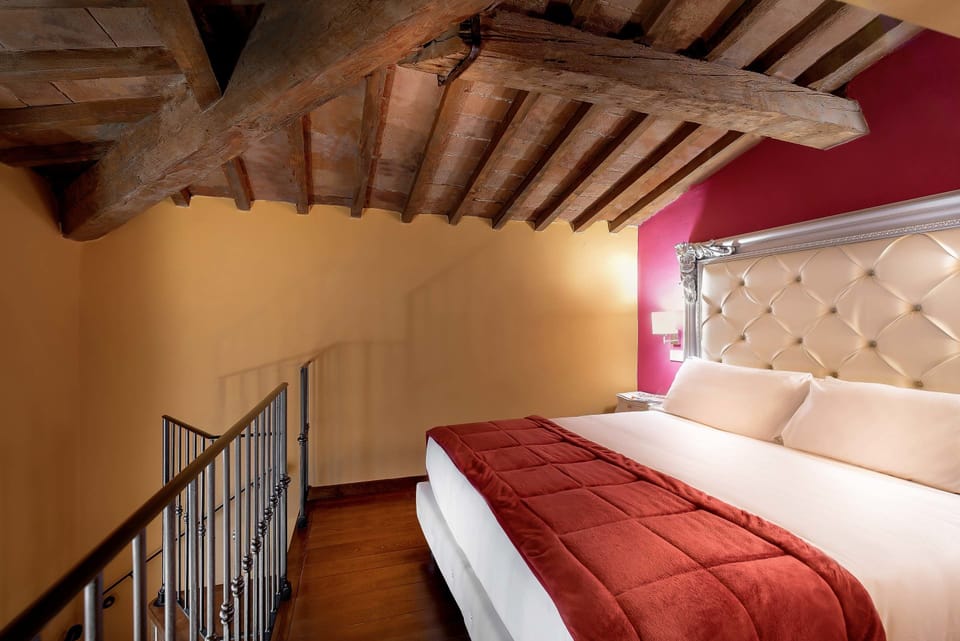 Classic Quadruple Room | Minibar, in-room safe, desk, soundproofing