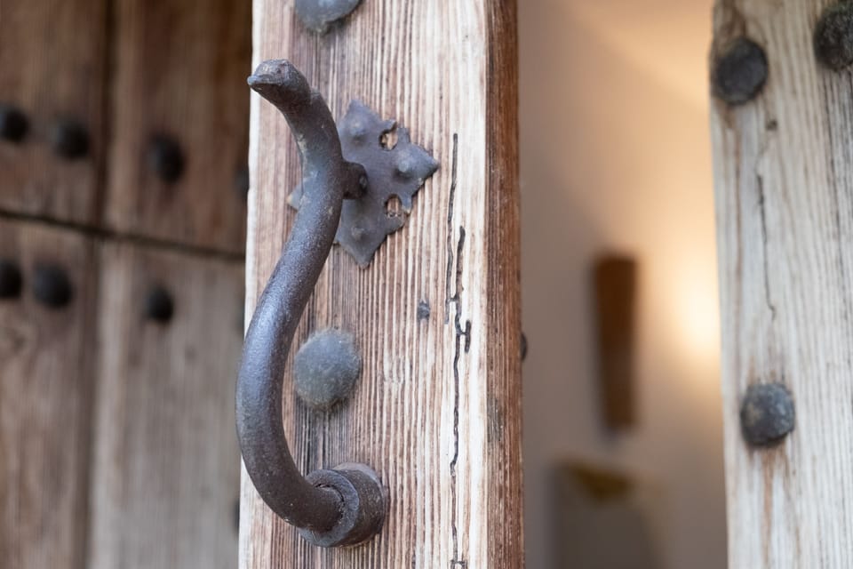 The antique front door.