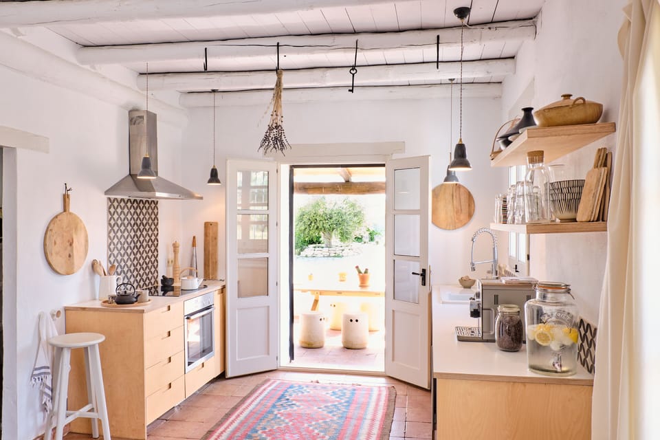 The open plan kitchen goes straight onto the west terrace with big table & views