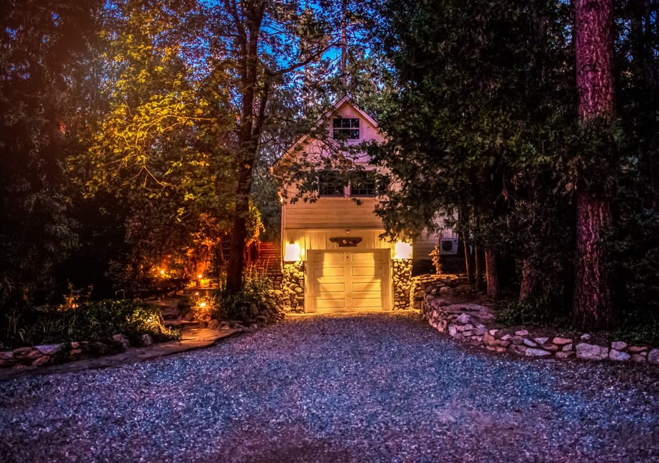 Front of the house at night. Plenty of parking.