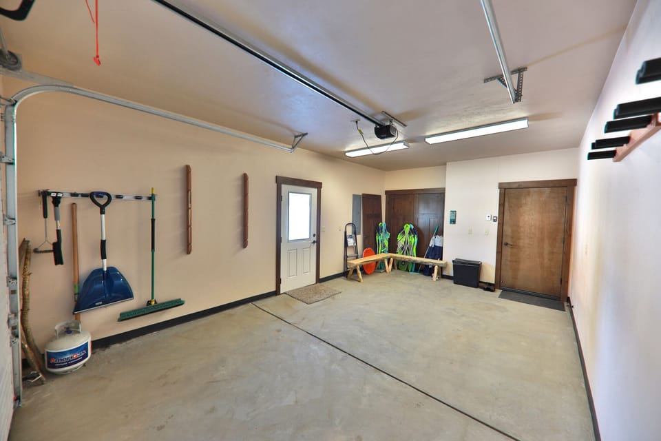 Nicely finished heated garage for your car and all your ski gear.