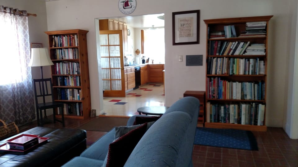 Living Room area has lots of interesting books for everyone's taste!