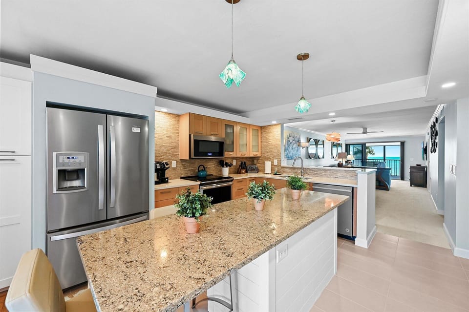 Kitchen and looking through condo to the gulf
