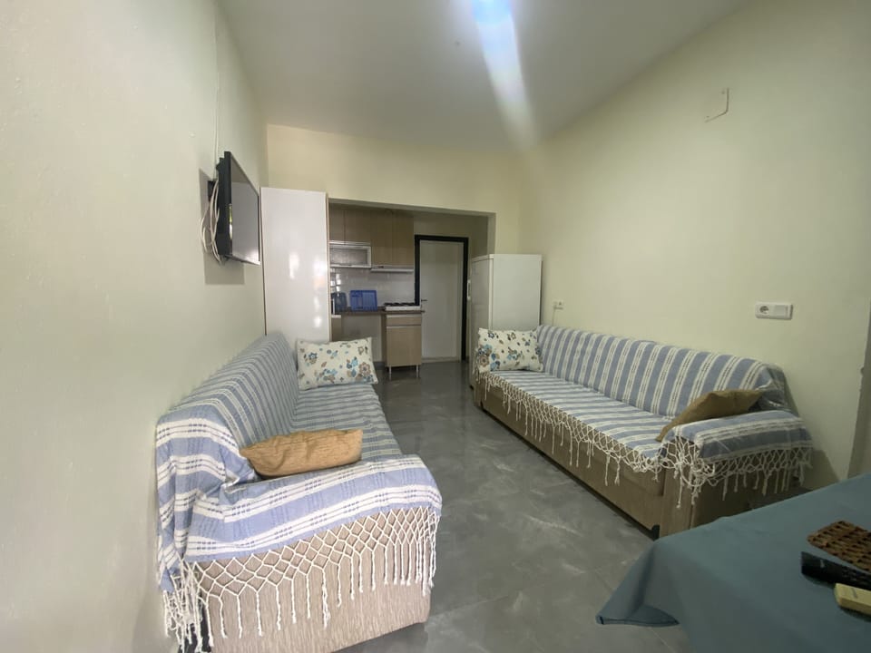 Apartment, 1 Bedroom | Living area | 32-inch LED TV with satellite channels, TV