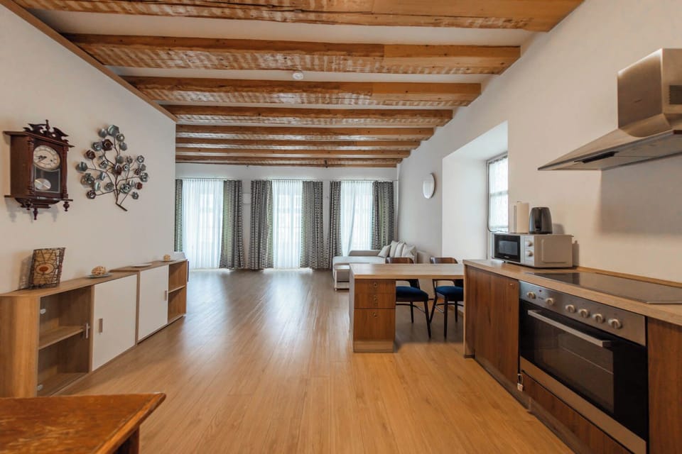 Comfort Studio | Living area | Flat-screen TV