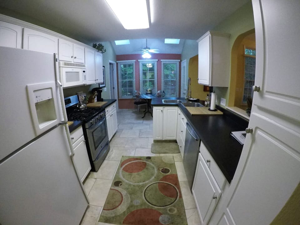 Gourmet Galley Kitchen, Stocked with Everything. Open to Great Room & Dining. 