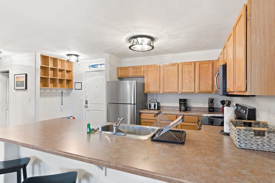 Condo, 2 Bedrooms | Private kitchen | Full-size fridge, microwave, oven, stovetop
