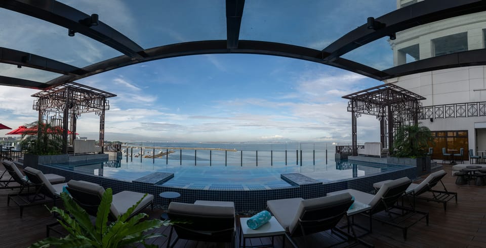 Outdoor pool, open 7:00 AM to 7:00 PM, sun loungers