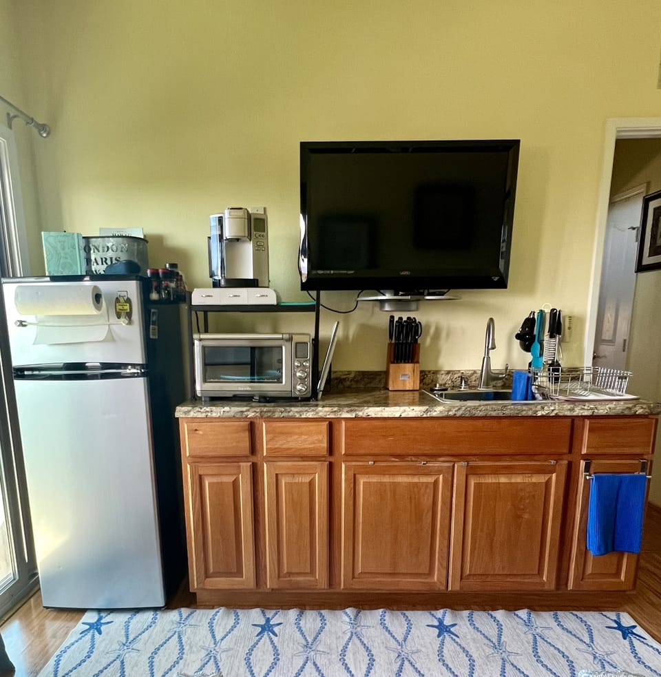 Your kitchenette has a toaster oven and coffee maker to start your morning.