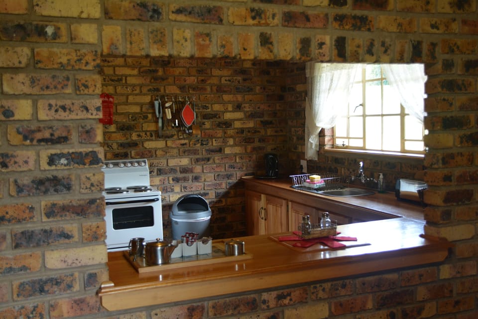 Family Bungalow | Private kitchen | Coffee/tea maker, full-size fridge, microwave, oven