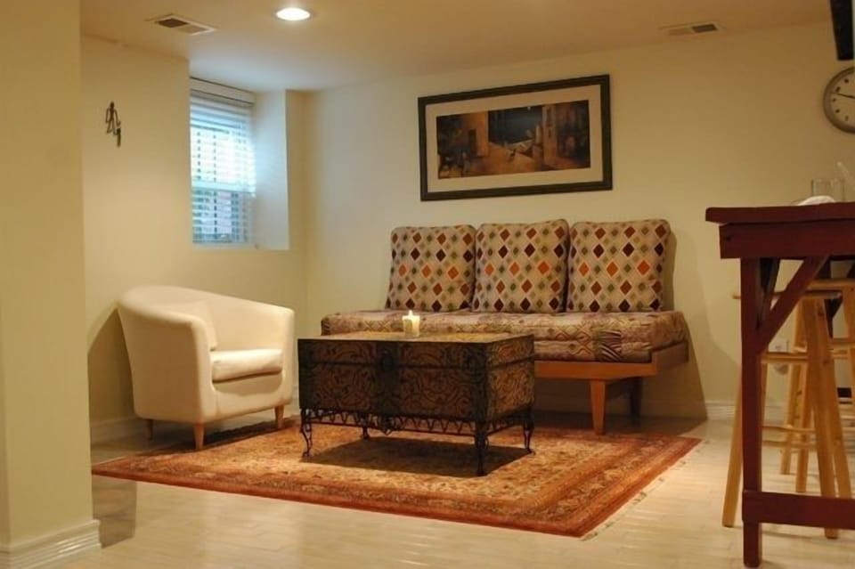 Living area w/ 2 daybeds. Serves as a twin or full.