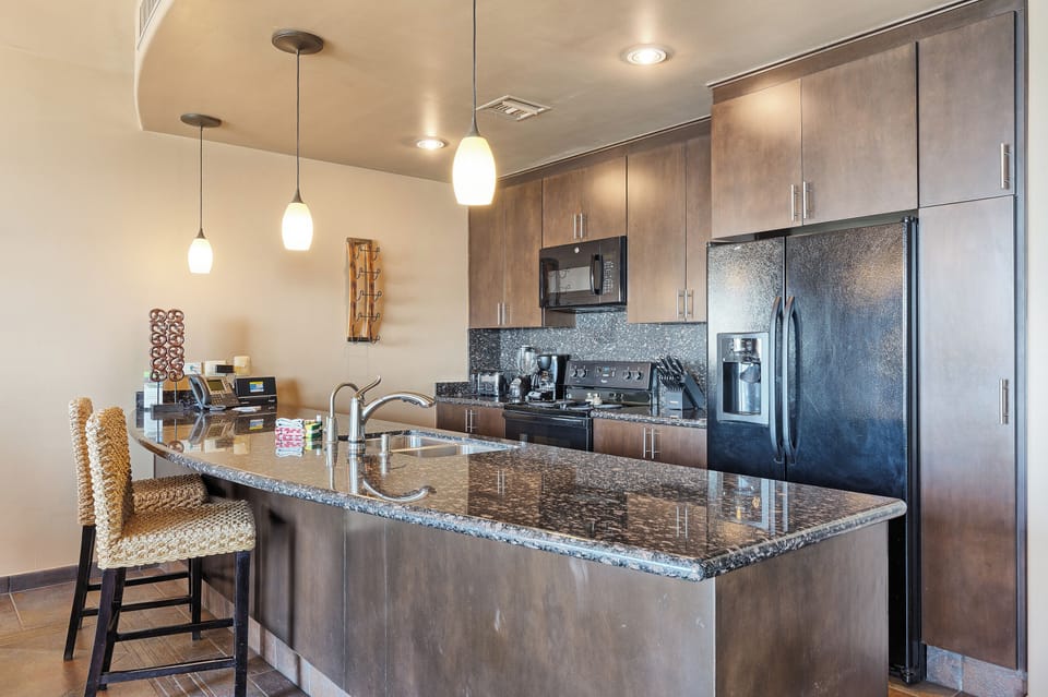 Fully stocked kitchen with every thing you need for food prep.