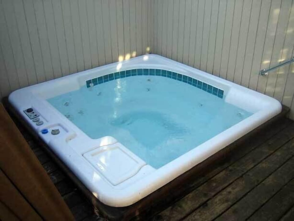 private hot tub off the back deck and master bath.
