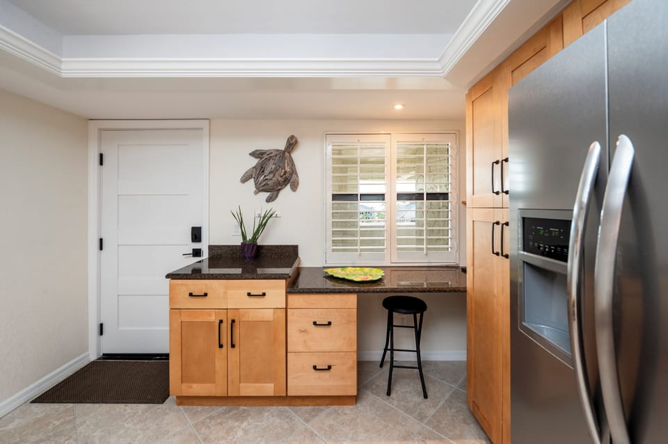 The kitchen has a pantry and plenty of space to store your grocieries.