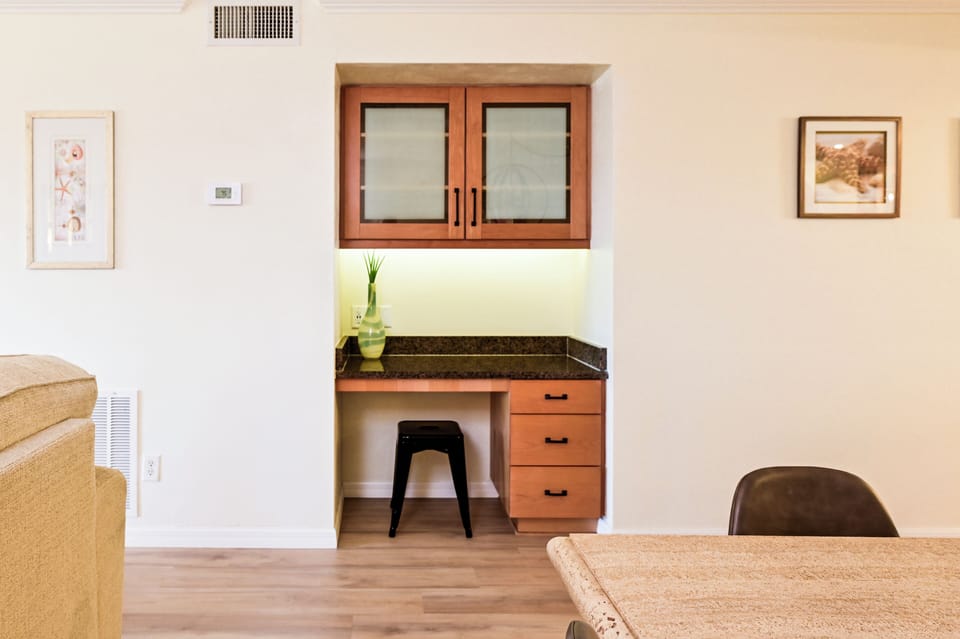 The desk nook provides space for electronics or charging.








