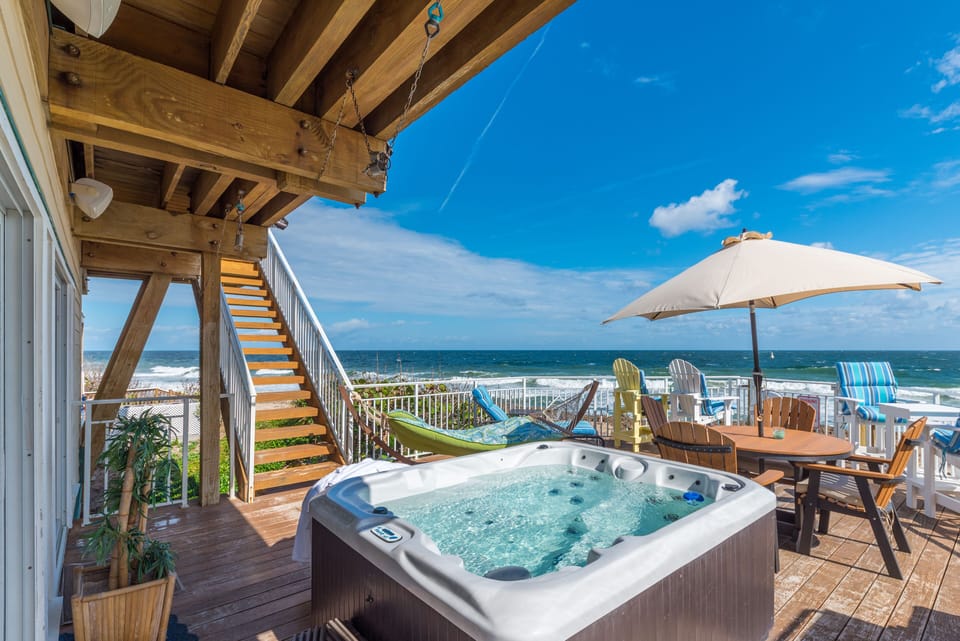 At "Carpe Diem", enjoy ocean views from your private hot tub.